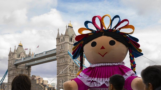 The giant Lele doll at the Tower Bridge in London, England in 2019.