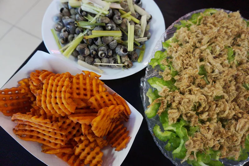 Image: From waffle-cut fries to snails in the shell, Giot Dang has drinking food covered.