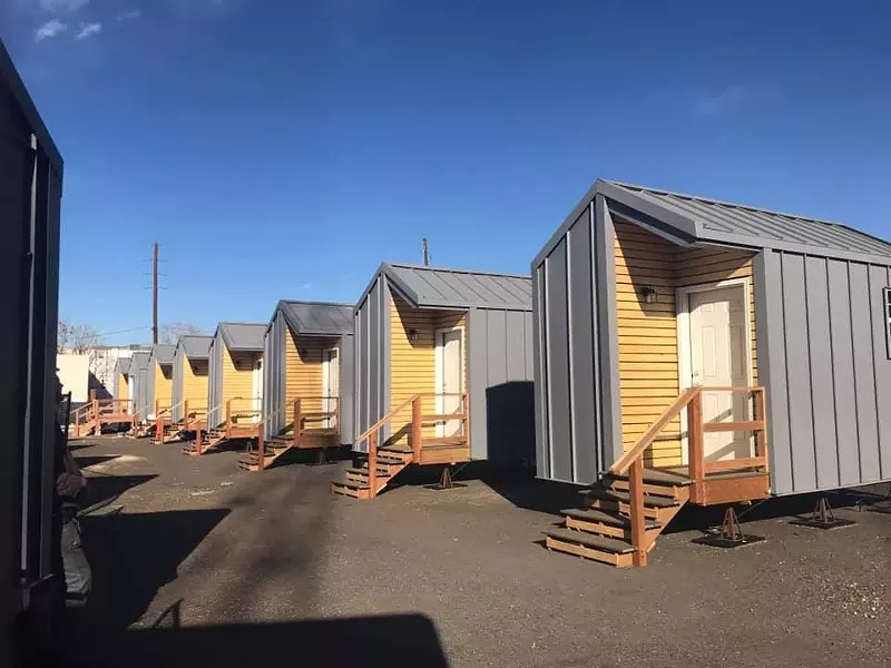 Image: There are eight new homes at the Beloved Community Village.