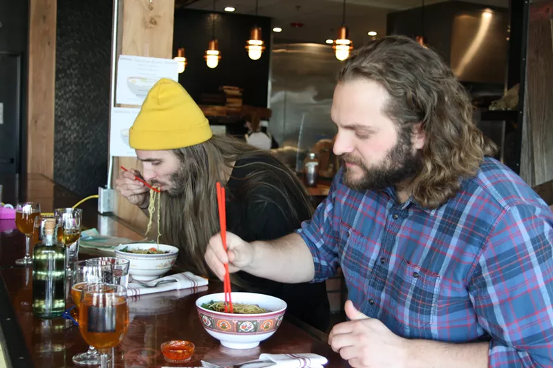 Image: Derek Sabiston and Dan Byers dive into their Sunday-only ramen bowls at Goed Zuur.