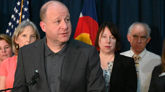 Gov. Jared Polis speaks to the press in his office on Monday, August 21.