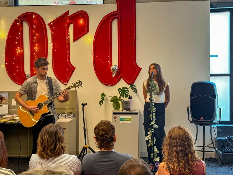 Image: singer performing in denver westword office