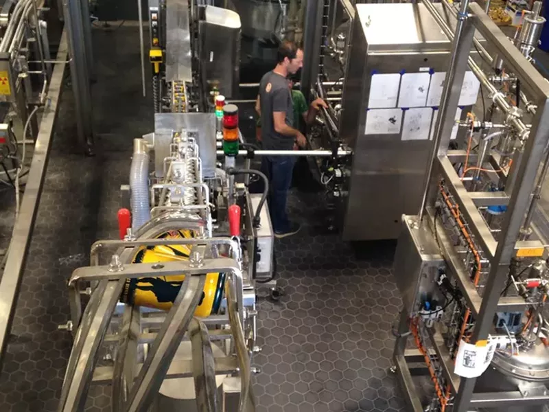 Image: Great Divide founder Brian Dunn before the opening of the new packaging facility in 2015.