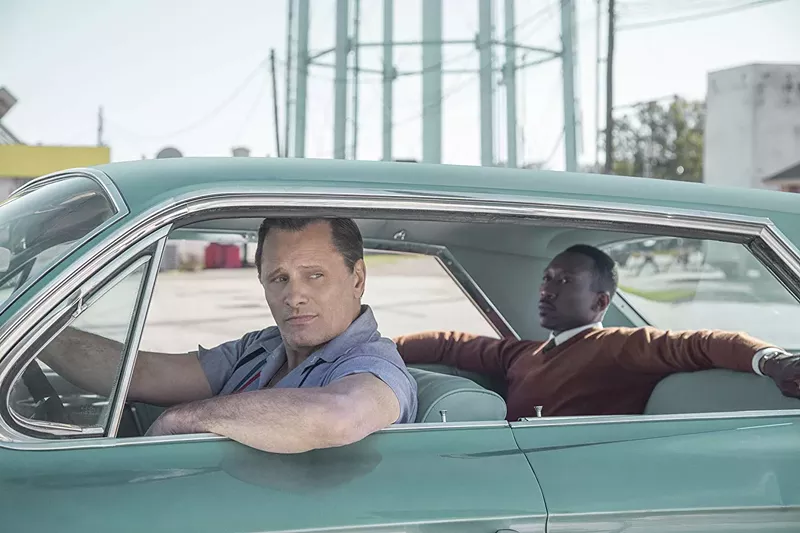 Image: In Green Book,, Viggo Mortensen (left) plays Tony Vallelonga, also known as Tony Lip, an Italian-American nightclub bouncer who becomes the driver for accomplished African-American classical pianist Don Shirley (Mahershala Ali).