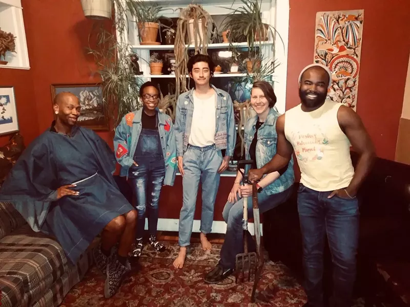 Image: Mac Liman, second from right, has lived in a communal house in Lincoln Park for thirteen years.
