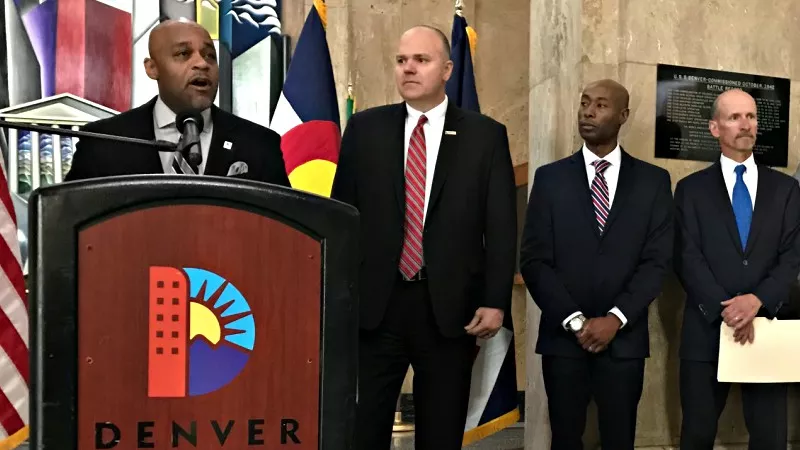Image: Denver Mayor Michael Hancock at the event announcing the launch of the Public Integrity Division with (left to right) Executive Director of Public Safety Troy Riggs, PID director Eric Williams and former U.S. Attorney Bob Troyer.