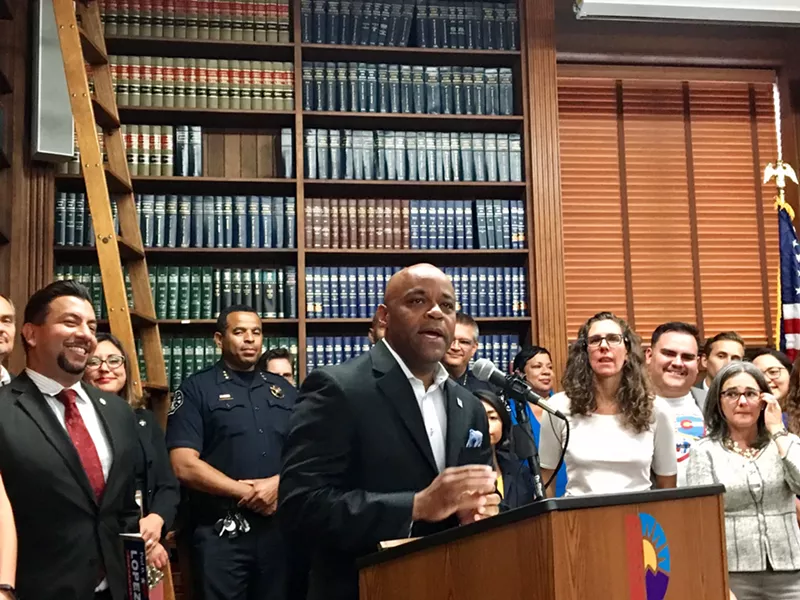 Image: Mayor Michael Hancock at the bill signing on August 31.
