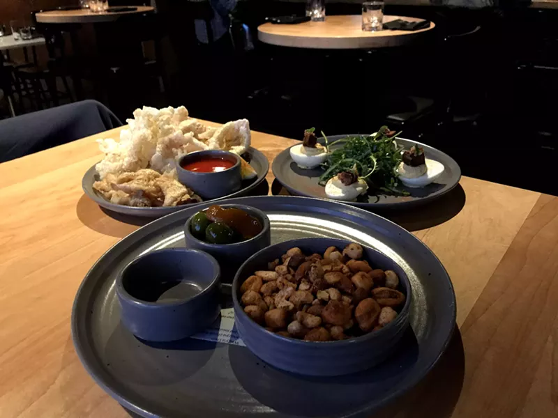 Image: Four out of the five happy-hour offerings at American Elm.