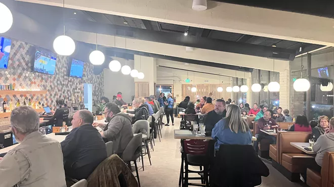 Patrons seated inside a restaurant