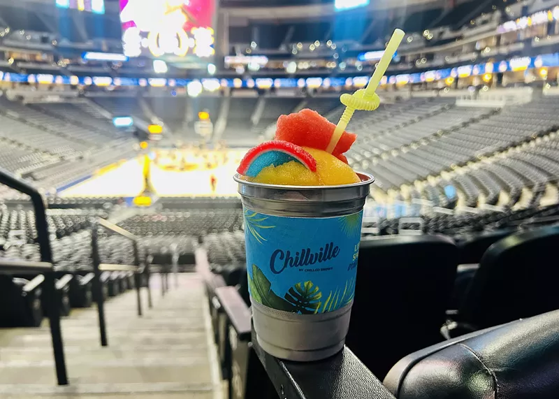 Image: a frozen drink in a cup inside an arena
