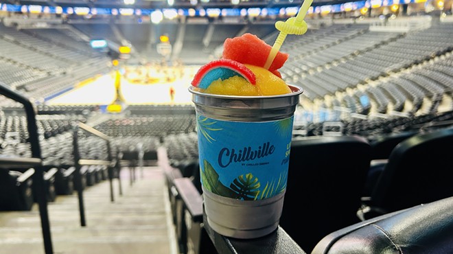 a frozen drink in a cup inside an arena