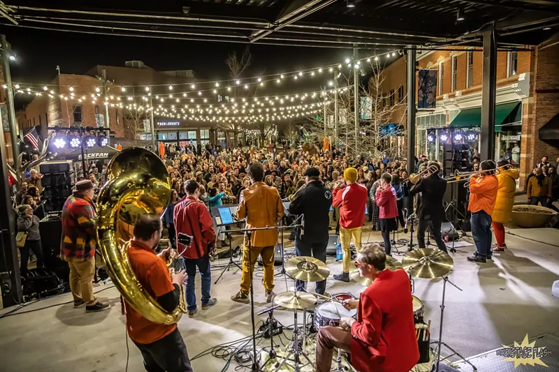 Image: brass band performing on stage