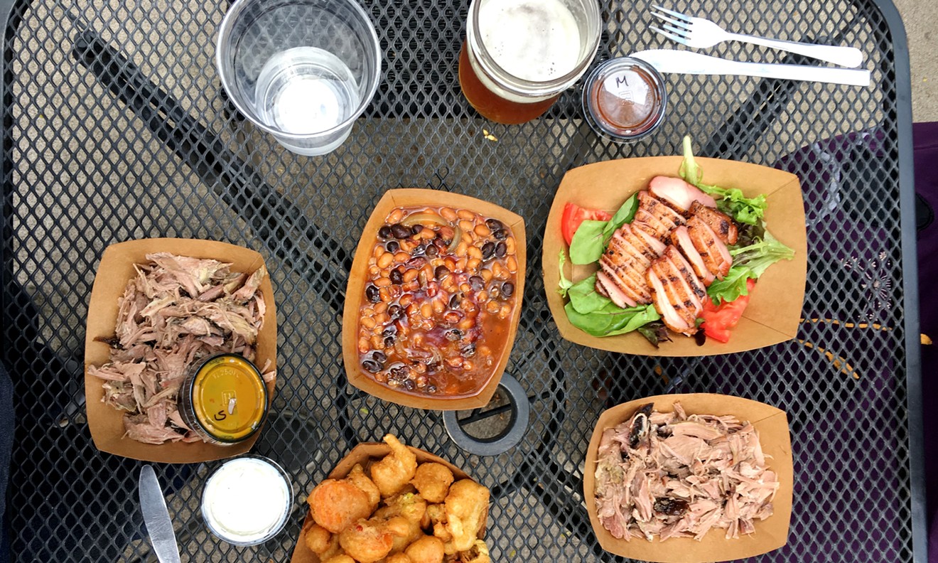 Pulled pork, beans, smoked duck, fried giardiniera and beer at Switchback Smokehouse in Kittredge.