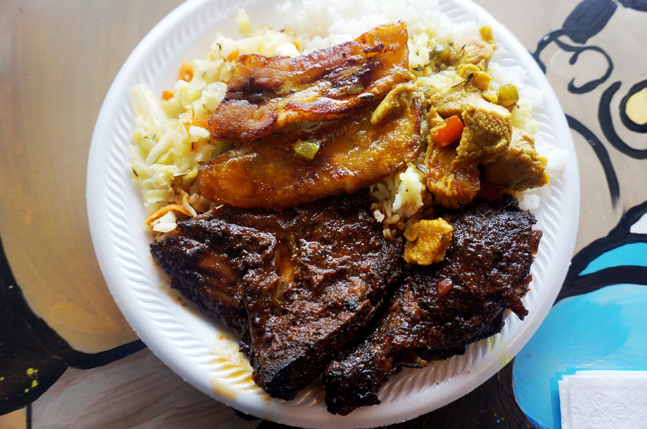 Jerk chicken with plantains, rice and cabbage (and a sample of curry chicken, because we love it) at Healthful Juices.