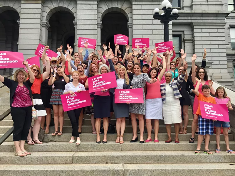 Image: Planned Parenthood, with Representative Brittany Pettersen (front row center), celebrates birth-control reform.