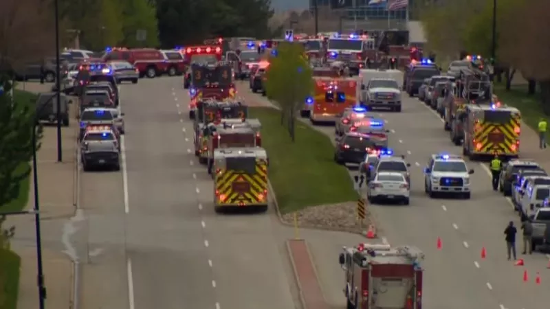 Image: Emergency and police vehicles gathered near the STEM School of Highlands Ranch campus after the May 7 shooting.