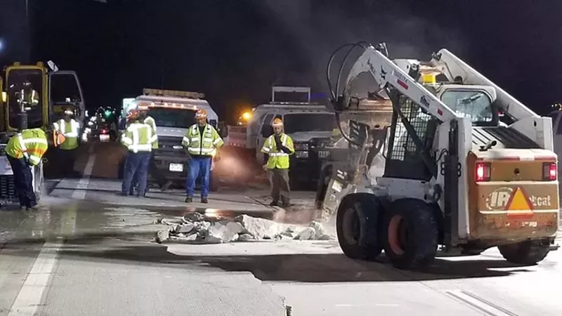 Image: Crews working on repairing Highway 36 during a mid-July evening following the collapse.