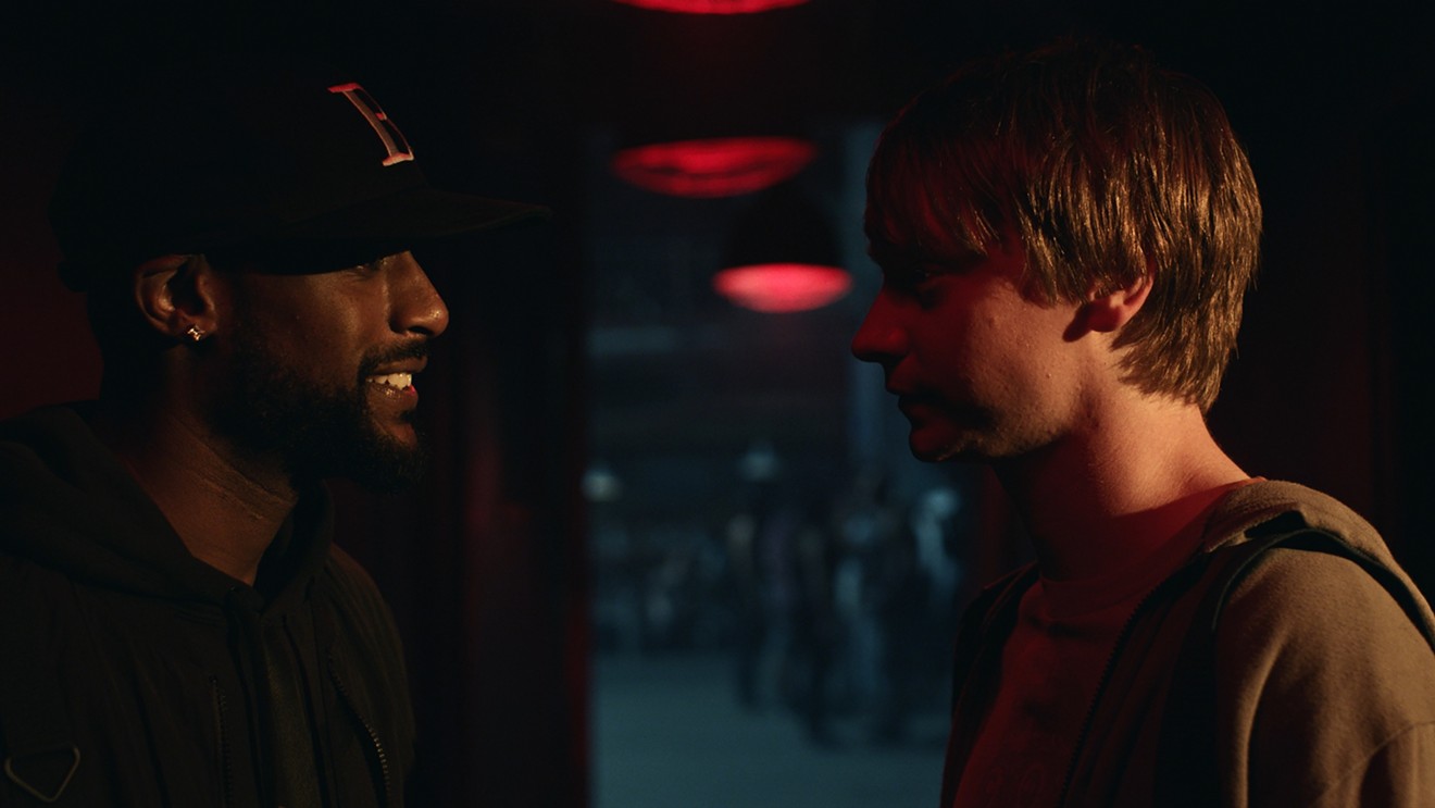 Calum Worthy (right) plays grad student Adam Merkin, who gets hooked on battle-rap competitions after consulting with a master named Behn Grymm (Jackie Long), in director Joseph Kahn's Bodied.