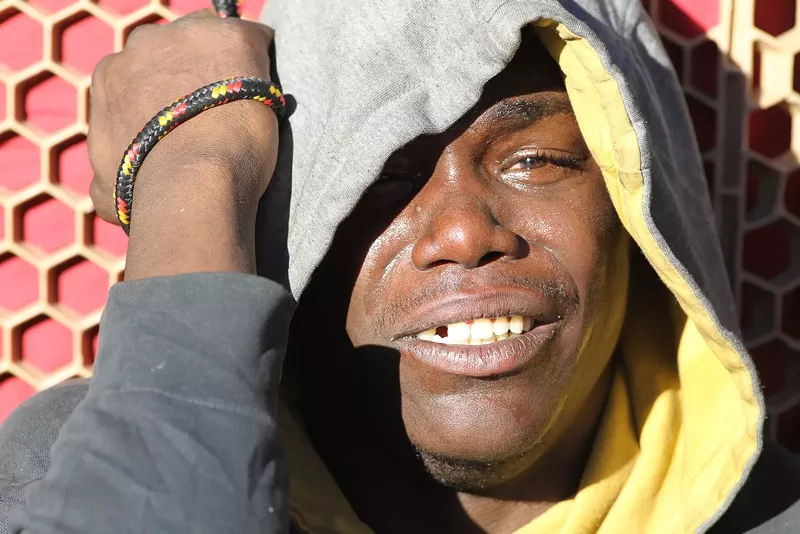 Image: A man gets emotional during a sweep of the homeless in Denver on November 15, 2016.