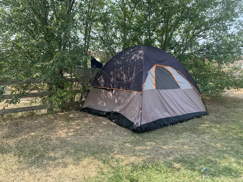 Image: A family evicted from an Aurora apartment was living in this tent.