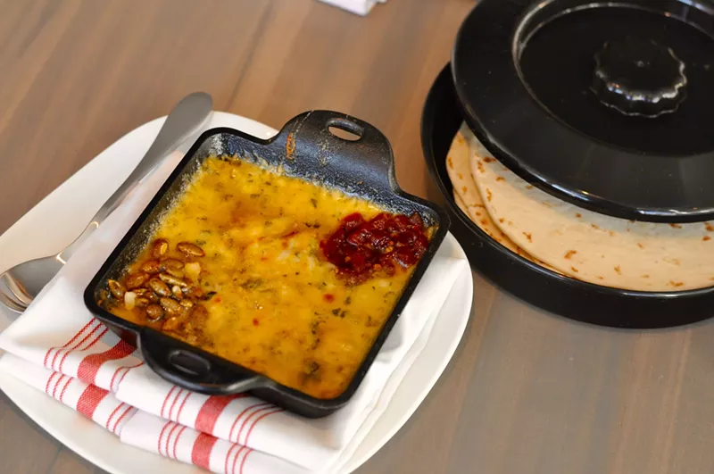 Image: Santo's queso fundido is a blend of many cheeses plus additional accoutrements.