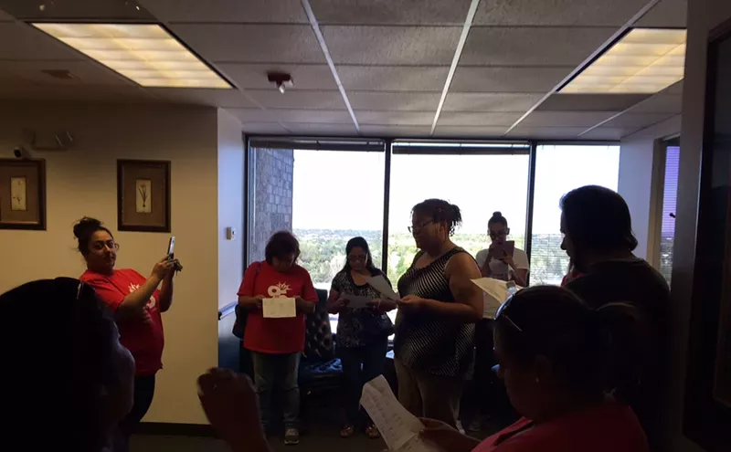Image: Housing Activists Stage Mock Eviction at Office of Major Law Firm