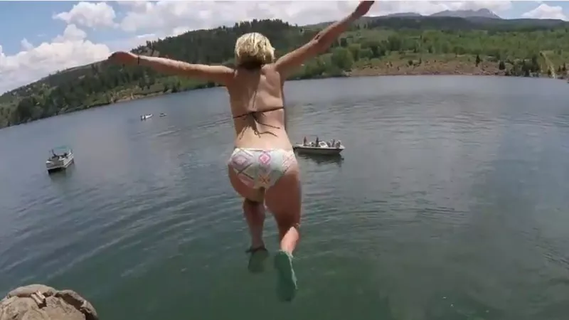 Image: A screen capture from a Green Mountain Reservoir cliff-diving video shot on July 26, less than a week before a fatal accident at the location.