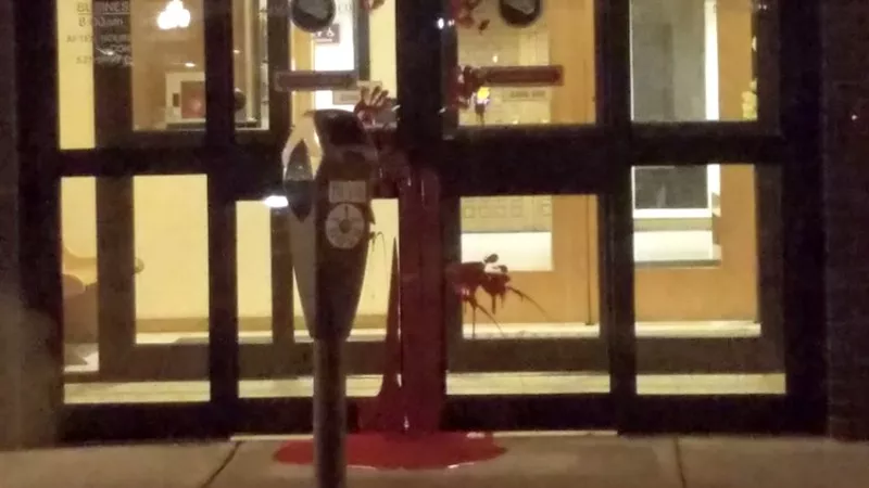 Image: Red paint was found splashed on the door of 4th Judicial District DA Dan May on the morning of November 15.