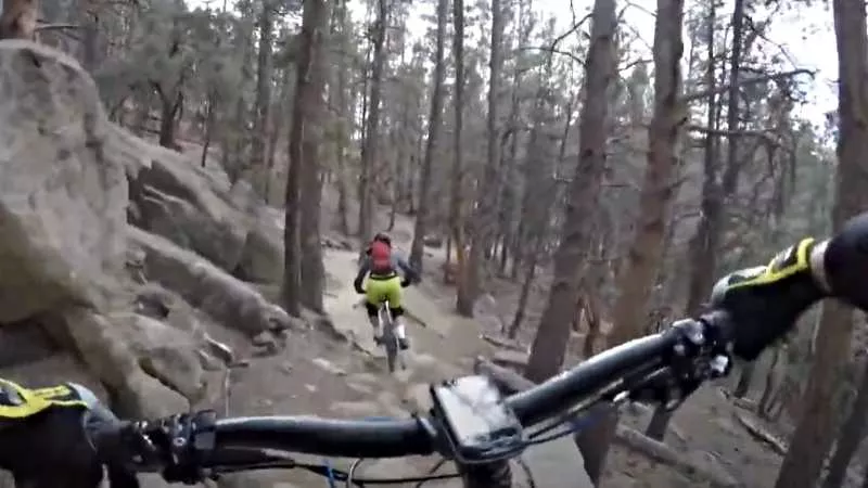 Image: Cyclists on a trail in the popular Lair O' the Bear park near Evergreen.