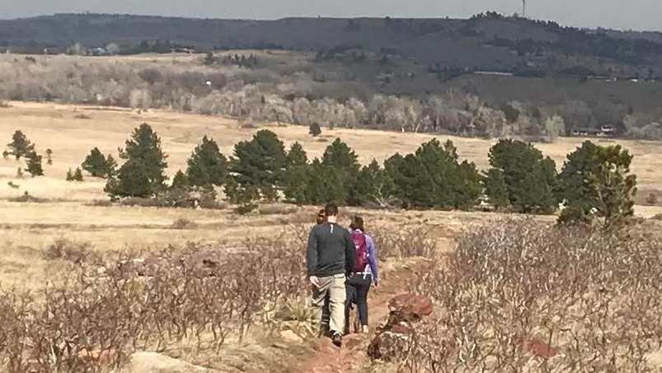Hikers walking along the South Boulder Creek trail on March 18.