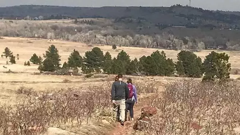 Image: Hikers walking along the South Boulder Creek trail on March 18.