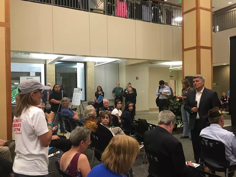 Image: Cory Gardner listens to a question about what he will do to prevent gun violence.