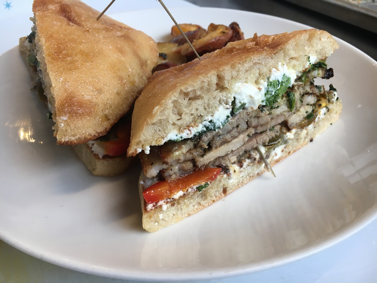 The East Coast porchetta sandwich is a pork lover's dream at SK Provisions.