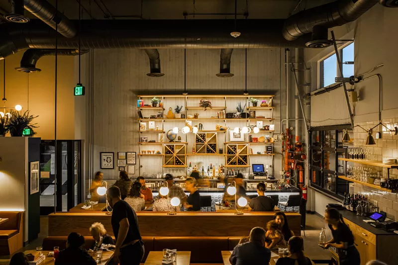 Image: people inside a busy restaurant