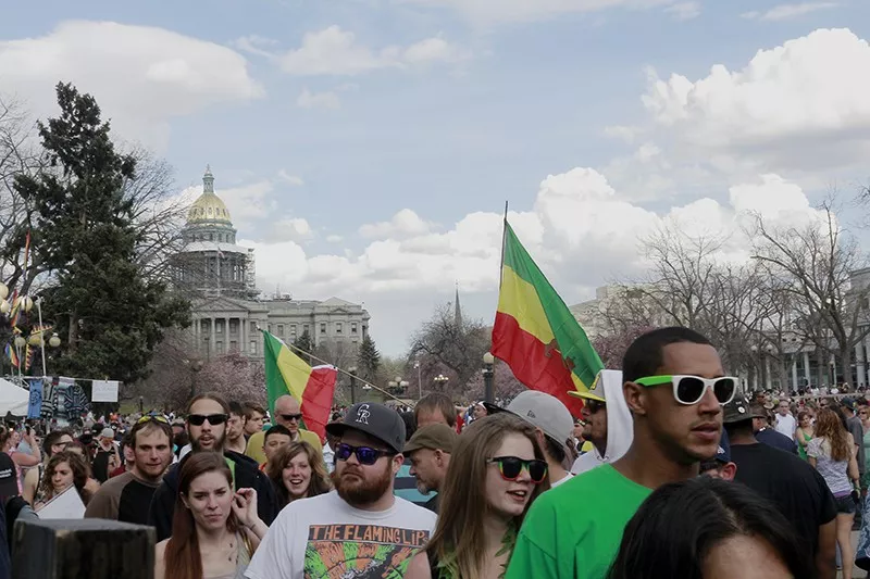 Image: The 420 Rally in Civic Center Park is largely attended for free music and blunts nowadays, but you find still catch some pockets of activism.