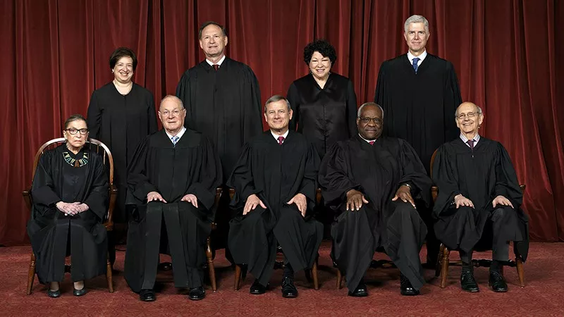 Image: The nine U.S. Supreme Court justices who'll hear oral arguments in the Masterpiece Cakeshop case today, December 5.