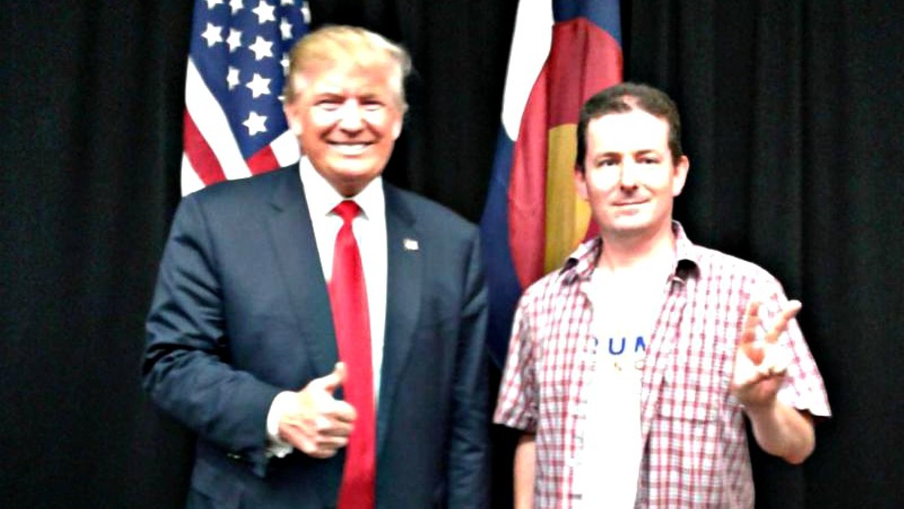 An undated photo of David Reid Ross posing alongside President Donald Trump, as seen on a candidate guide published by the Boulder County Republicans.