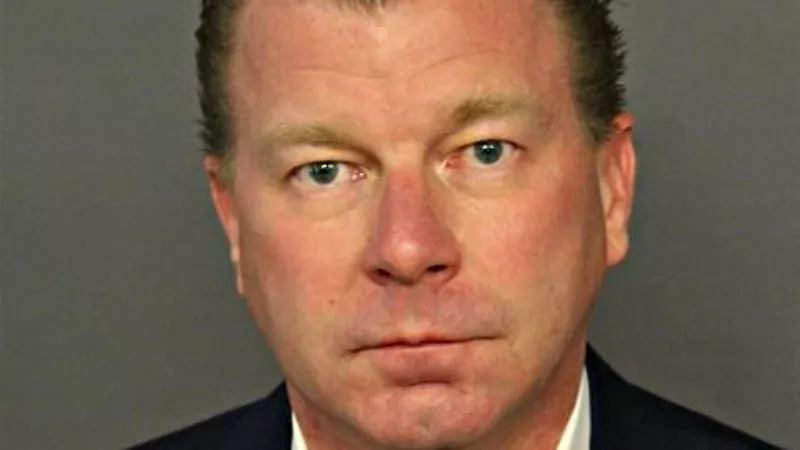 Image: Rob Corry's most recent booking photo.