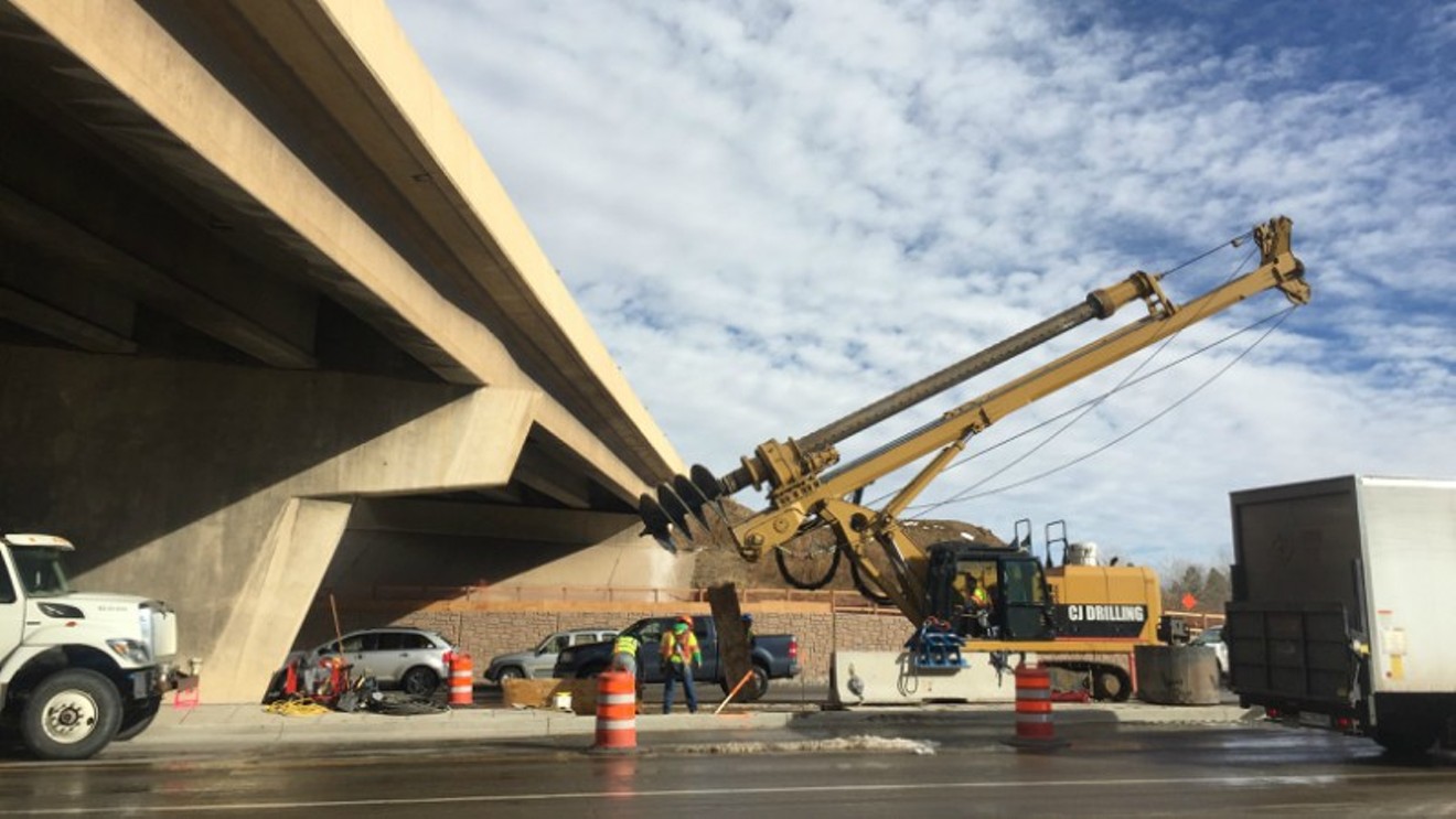 A drill rig beneath the Broadway bridge circa December 2017. This photo is part of a large gallery documenting the project of the C-470 Express Lanes project.