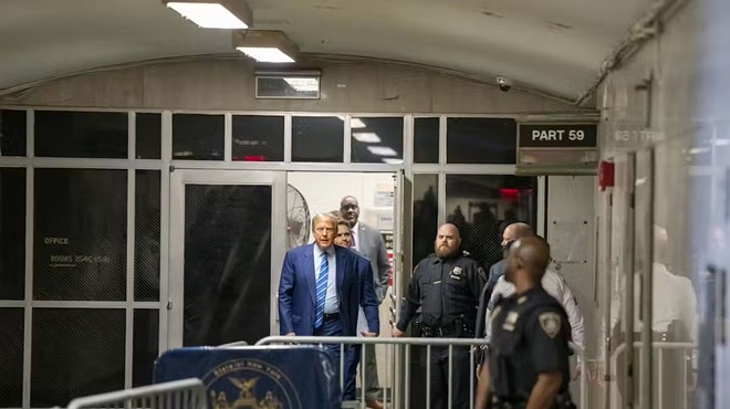 Donald Trump walks out of court