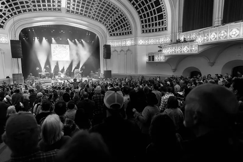 Image: Black and white photo of a concert.