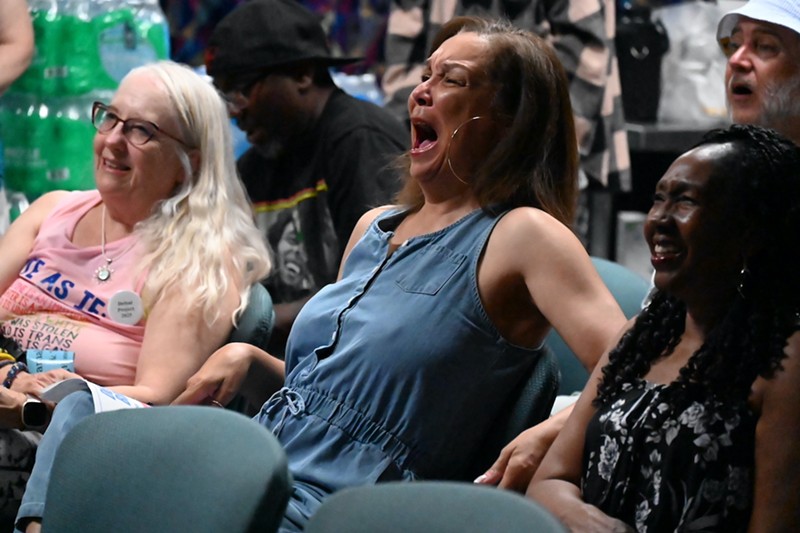 Denver resident Vernita Hamilton reacts to former President Donald Trump calling Vice President Kamala Harris a "marxist" during the presidential debate on Tuesday, September 10.