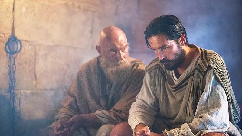 Image: James Faulkner (left) plays the aging apostle Paul, and Jim Caviezel is Luke, the Greek physician who has already authored one Gospel, in writer-director Andrew Hyatt's Paul, Apostle of Christ.