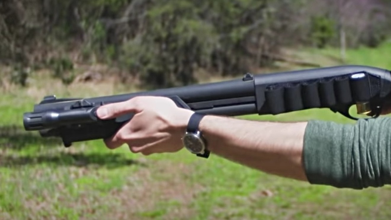 A Remington 870 in action.
