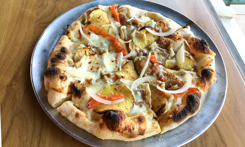 Image: If you have a few extra clams, spend them on this pie at Pizzeria Locale.