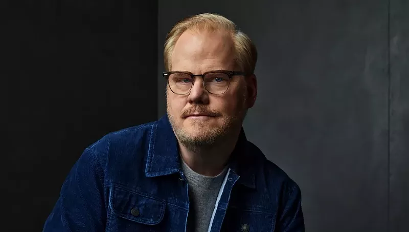 Image: man posing in a denim shirt