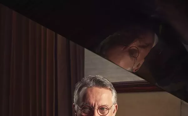 Image: John A. Kite on piano