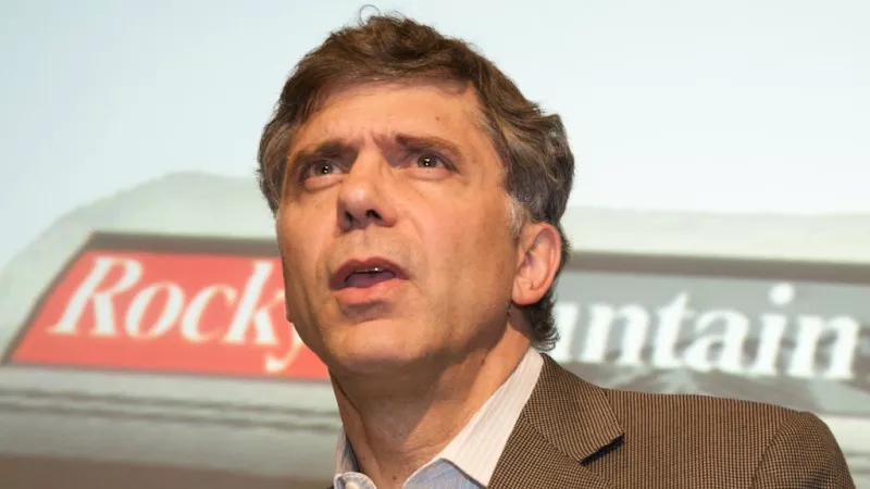 Image: Rocky Mountain News editor, publisher and president John Temple at the February 26, 2009, announcement that the tabloid's last edition would be published the next day.