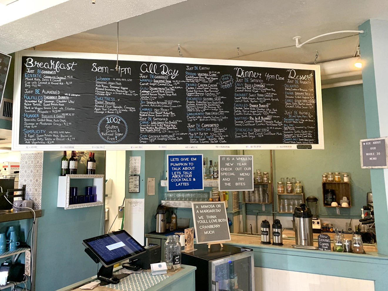 Supportive Whole30 signage displayed at Just Be Kitchen.