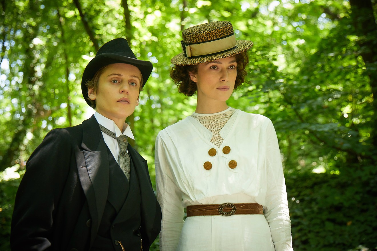 Keira Knightley (right) is the title character in Colette, a married French novelist who, as her marriage opened up, began to take lovers of her own, including the proudly masculine Missy (Denise Gough).